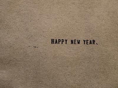 Happy New Year written on rough paper